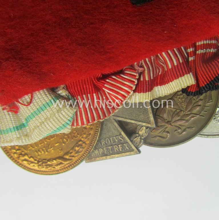 Superb, 8-pieced WWI- (ie. TR-) related medal-bar (ie. 'Ordenspange') depicting an: 'EKII.Kl., an: 'FKK 1914-18 mit S.', an: 'EZ für D. Vp 3. Stf.', a: 'TD-Ez. der 2. Kl.', a: 'Deu. Olympia-E.medaille 1936' and three Austrian WWI-period comm. medals