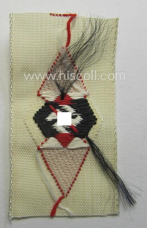 HJ (ie. 'Hitlerjugend') cap-badge (ie.: 'Raute') as executed in 'BeVo'-weave-pattern