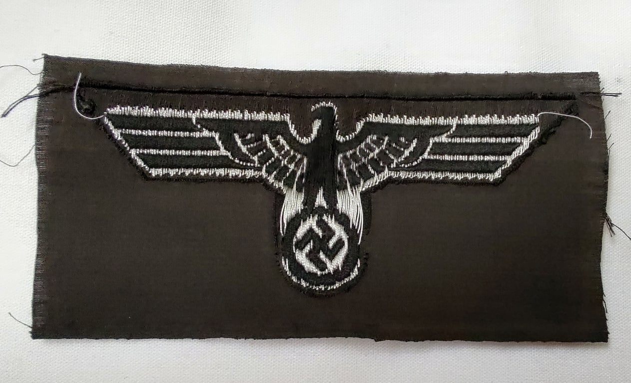 M35 Army (Heer) first pattern Panzer 'Bevo' flat wire officer breast eagle.