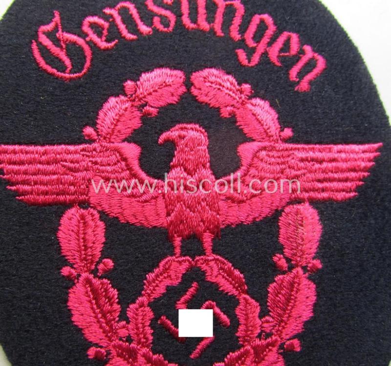 Fire-brigade (ie. 'Feuerwehr'-related-) armbadge (ie. arm-eagle) - being a scarcely encountered, regular-pattern- and/or woolen-based version that was intended for usage by a member serving within the: 'Feuerwehr Gensungen'