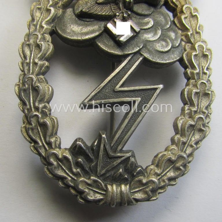 Mid- (ie. later-) war-period, zinc- (ie.'Feinzink'-) based version of a WH (Luftwaffe) 'Erdkampfabzeichen' (being a maker-marked example by the 'G.H. Osang'-company having a silvered- and 'riveted' eagle-device attached)