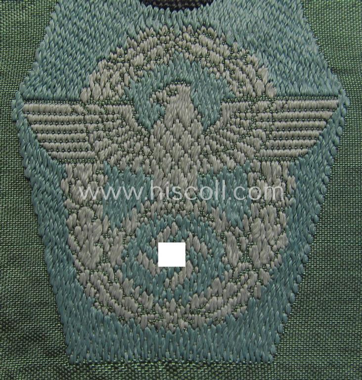 Neat, police (ie. 'Polizei') so-called: 'M43-pattern, 'combined cap-eagle- and cocarde-device' as executed in 'BeVo'-weave technique as was specifically intended for usage of the field-grey-coloured: 'Polizei-Einheitsfeldmützen'