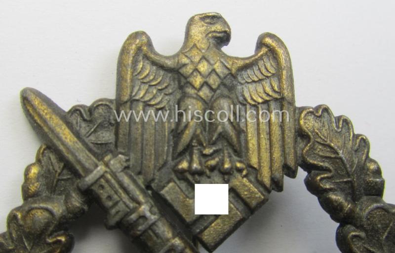 'Infanterie Sturmabzeichen in Bronze' being a maker- (ie. 'JFS'-) marked, 'solid-back' example by the desirable maker: 'Josef Feix u. Söhne' as was executed in golden-bronze-coloured, zinc-based metal