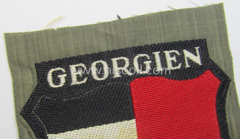 Attractive, 'BeVo'-type armshield entitled: 'Georgien' (being a 'virtually mint- ie. unissued' example as intended for a volunteer who served within the 'Deutsche Wehrmacht' ie. within the 'Georgisches Legion')