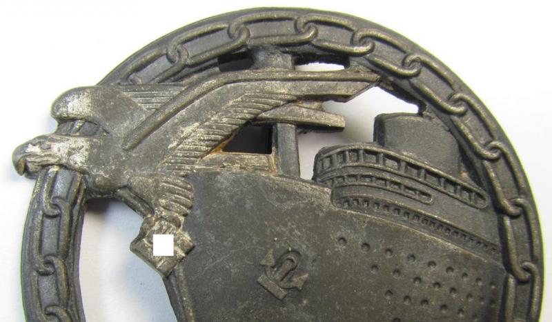 Attractive, WH (Kriegsmarine) 'Blockadebrecher-Kriegsabzeichen' being a maker- (ie. 'Fec. Otto Placzek Berlin - Ausf. Schwerin - Berlin'-) marked example as was executed in multi-coloured zinc (ie. 'Feinzink')