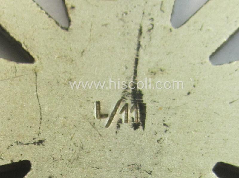 Attractive - and just moderately used! - example of a: 'Kriegsverdienstkreuz 1. Kl. mit Schwertern' being a maker- (ie. 'L/11'-) marked (and/or: 'Buntmetall'-based!) specimen that came as issued and/or stored for decades