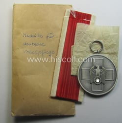 Complete medal-set: 'Medaille für Deutsche Volkspflege' being a...