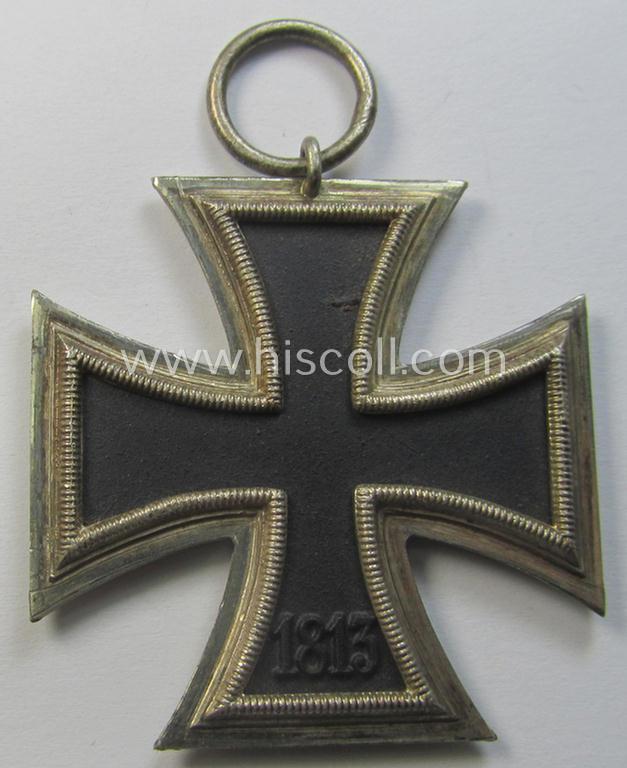 'Eisernes Kreuz II. Klasse' being a non-maker-marked example that comes together with its original- and once-mounted ribbon (ie. 'Bandabschnitt') as was produced by a (by me) unidentified maker (ie. 'Hersteller')