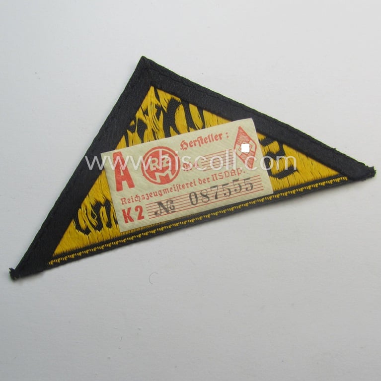 'HJ' ('Hitlerjugend') district-triangle (ie. 'Gebietsdreieck') entitled: 'Ost Sudetenland' (being a 'virtually mint' example that retains its period-attached, paper-based so-called: 'RzM'-etiket)