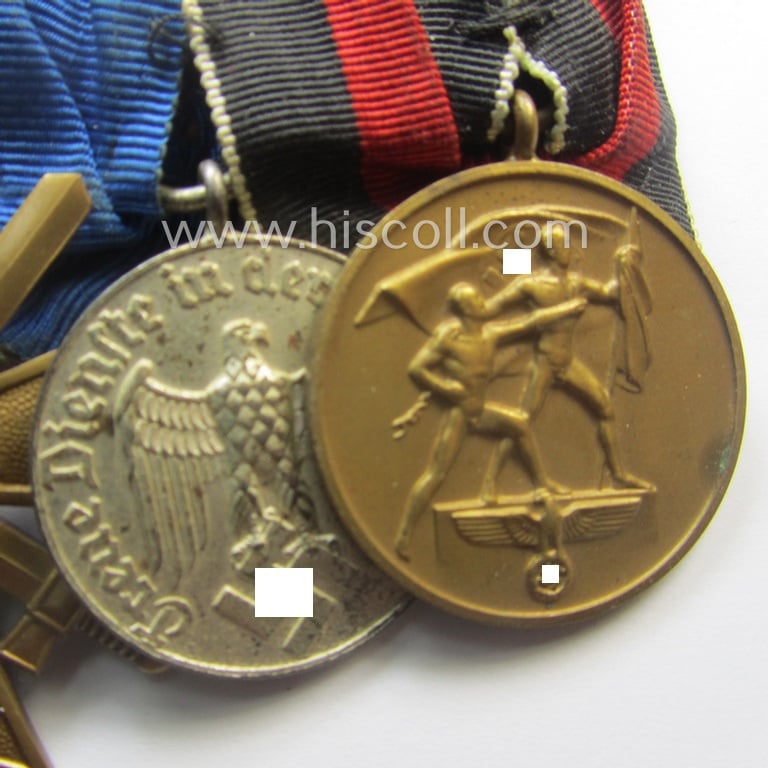 Superb, 4-pieced WH (LW) medal-bar (ie. 'Ordenspange')showing an: 'EK II.Kl.' (in the 'Schinkel'-pattern!), a: 'KvK II.Kl. mit Schw.', a: WH (LW) so-called: 'DA für 4 Jahre t. Dienste' and a: WH Czech 'Anschluss'-medal: '1. Oktober 1938'