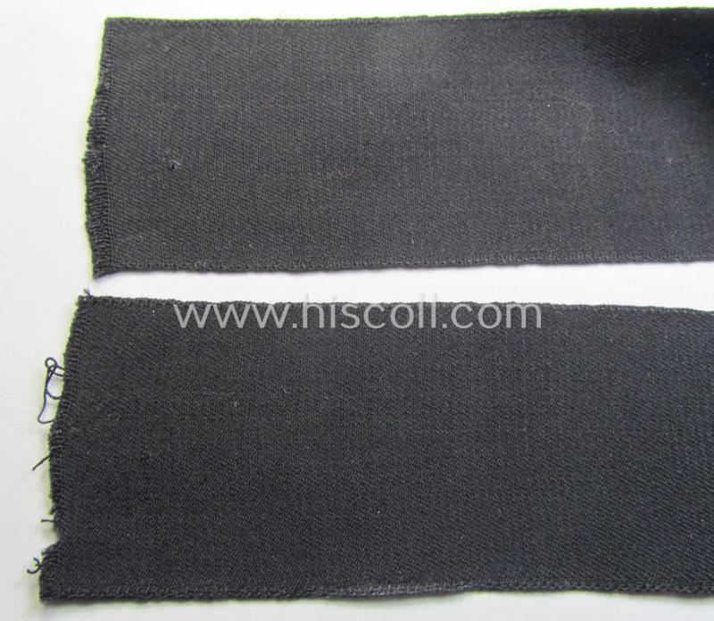 Superb - and most certainly rarely seen! - WH (Heeres) related cuff-title (ie. 'Ärmelstreifen für Führer') being a typical black-coloured- and linnen-based example showing the (neatly silver-toned- and 'flatwire'-woven!) text that reads: 'Feldpo...