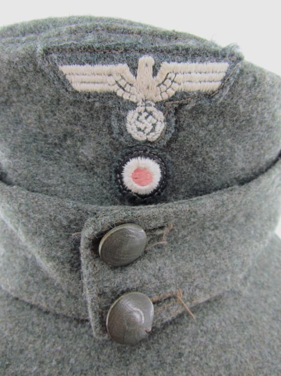 Late war Italian made double button Heer M43 field cap