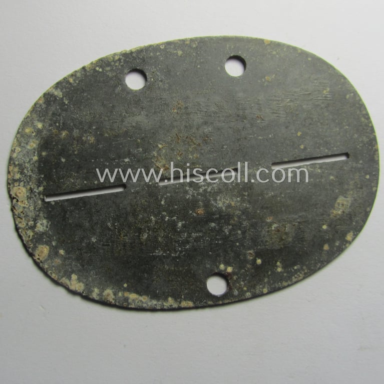 Rarely found, zinc-based WH (Heeres-) ie. 'geheime Feld Polizei'-related ID-disc (ie. 'Erkennungsmarke') bearing the clearly stamped unit-designation that reads: 'Gruppe geh.F.Pol. 644' and that comes as issued and/or worn
