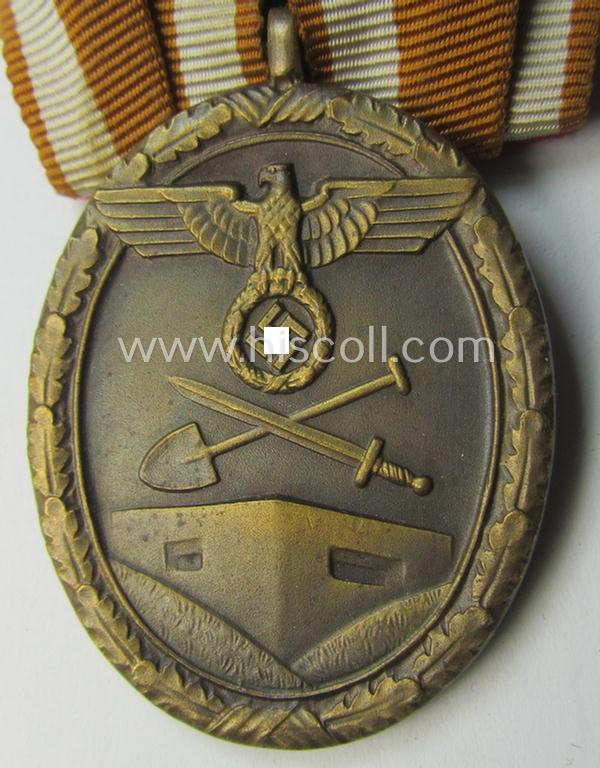 Single-pieced, non-detachable WH medal-bar (ie. 'Orden- o. Einzelspange') showing a: 'Deutsches Schutzwall Ehrenzeichen' (aka: 'Westwall'-medal)