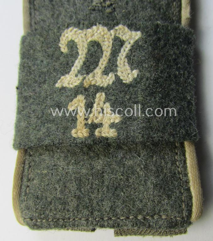 Attractive - albeit regrettably single! - later-war-period- (ie. 'M44 o. M45'-pattern-) WH (Heeres) EM-type shoulderstrap that comes with its attached 'Übershube' as was intended for a: 'Soldat des Inf.-Maschinengewehr-Abts. 14'