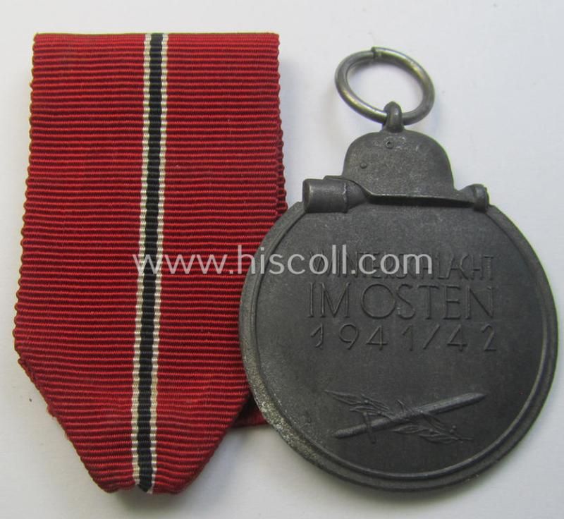 Attractive medal-set: 'Winterschlacht im Osten 1941-42' being a non-maker-marked- (and/or 'Feinzink'-based) specimen and that comes together with its (minimally confectioned) ribbon (ie. 'Bandabschnitt')