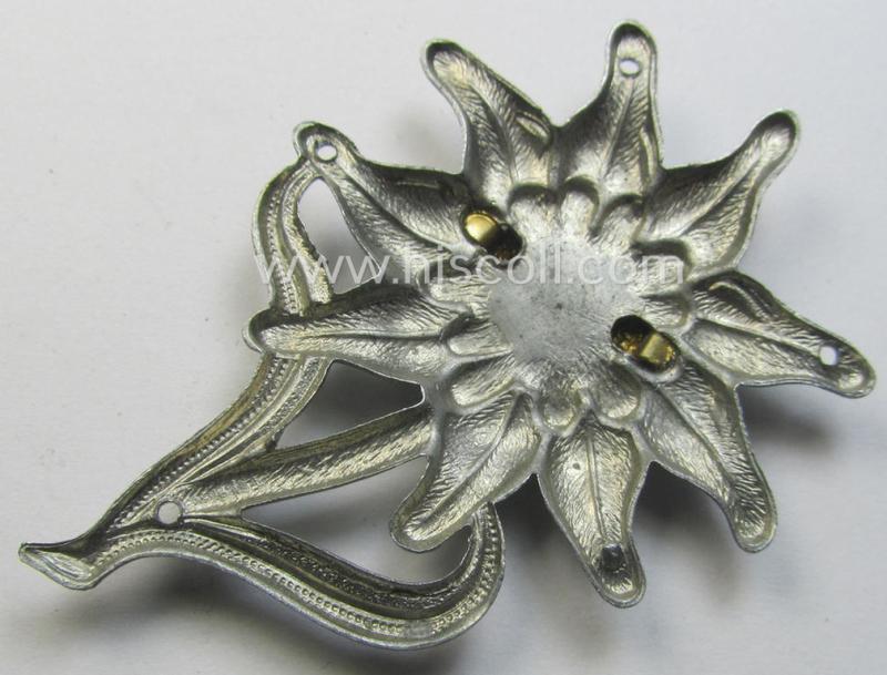 WH (Heeres) (bright) silverish-coloured, zinc-based (albeit non-maker-marked): 'M43'-pattern 'Edelweiss'-cap-badge (ie. 'Mützenabzeichen')