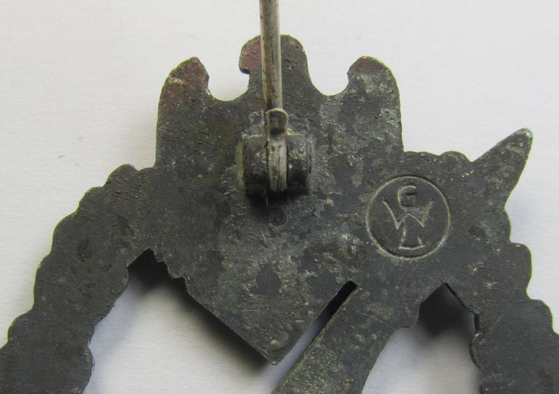 'Infanterie-Sturmabzeichen in Silber' (or: silver-class IAB) being a clearly maker- (ie. 'GWL'-) marked, zinc- (ie. 'Feinzink'-) version ie. molded-'variant' as was procuded by the: 'Gebrüder Wegerhoff'-company