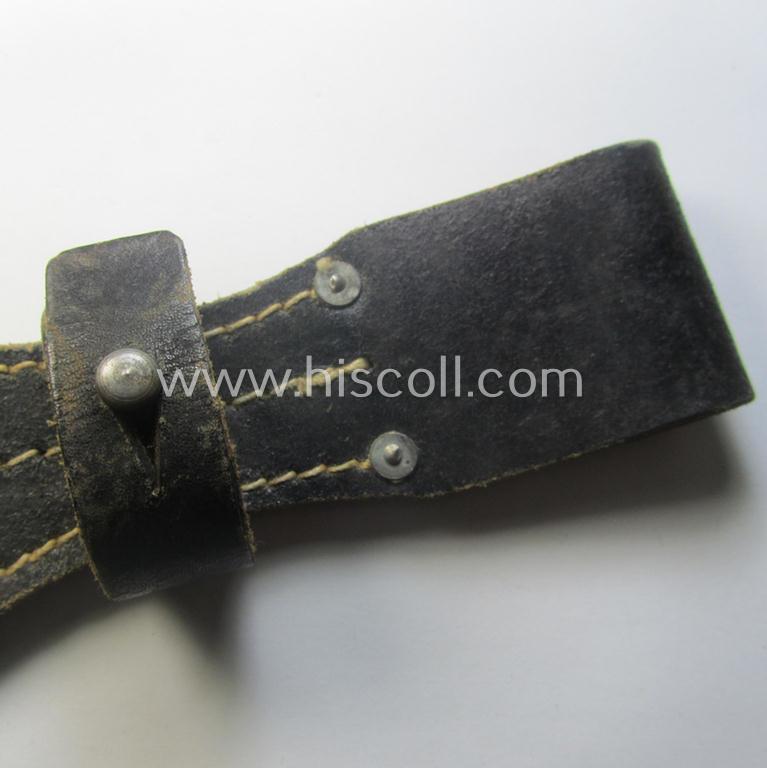 Genuine-leather-based- and/or black-coloured, 'standard-pattern' (and I deem later-war-period) WH (Heeres, Waffen-SS, Luftwaffe etc.) so-called: K98 bayonet-frog (ie. 'Tragetasche o. Koppelschuh') being a maker-marked (ie. 'RbN.'-numbered) exam...