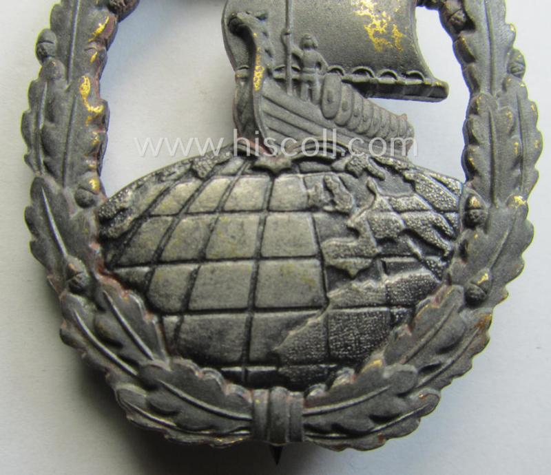WH (KM) 'Hilfskreuzer-Kriegsabzeichen' (or: auxiliary-cruiser war-badge) being a typical, maker- (ie. 'R.S.'-) marked- and/or: 'Feinzink'-based example as was produced by the: 'Rudolf Souval'-company