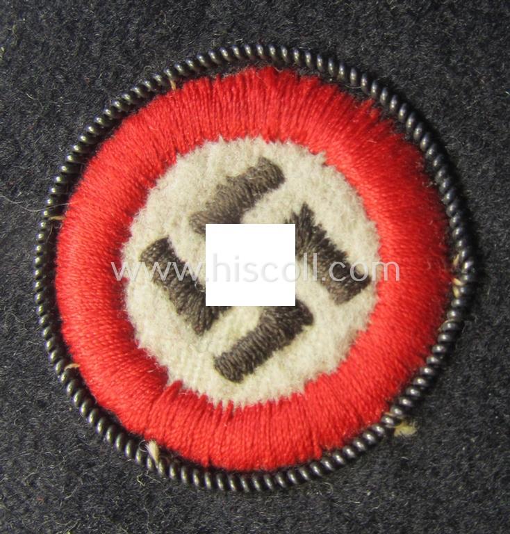 Attractive - and truly rarely encountered! - neatly hand-embroidered, 'N.S.D.A.P.'-related sleeve-diamond (ie.: 'Ärmelraute') showing a: 'Parteiabzeichen' as was specifically worn by (early-period!): 'N.S.D.A.P.-Stabsleiter'