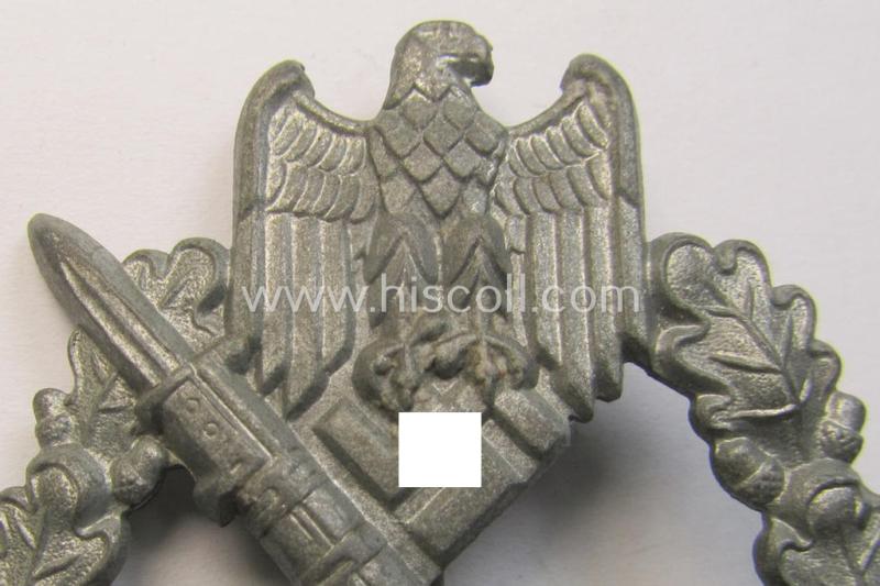'Infanterie Sturmabzeichen in Silber', being an unmarked (and/or very converse- ie. vaulted-) 'hollow-back' example by the maker: 'Friedrich Linden' (ie. 'F.L.L.') as was executed in silver-coloured, zinc-based metal (ie. 'Feinzink')