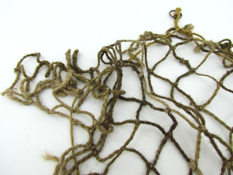 Complete late war German helmet net with attachment hooks