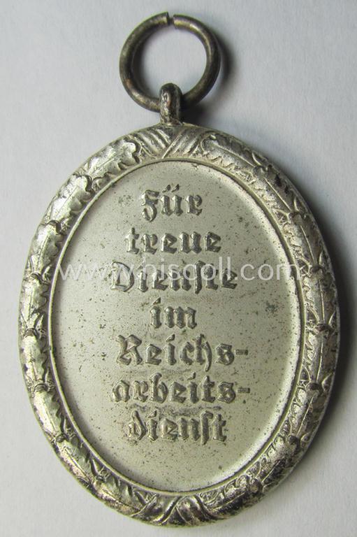 Attractive example of a: RAD (ie. 'Reichsarbeitsdienst') so-called: 'Dienstauszeichnung 3. Stufe für Männer' (as was intended for 12 years loyal-service) and that came together with its period piece of ribbon (ie. 'Bandabschnitt')