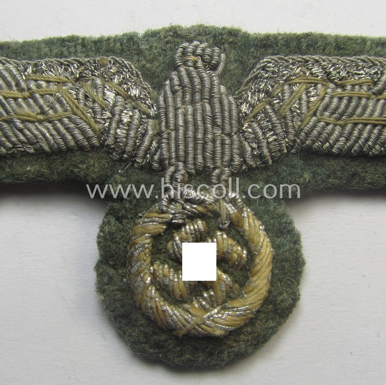 Clearly used- and/or cap-removed, WH (Heeres) officers'-pattern, visor-cap eagle (ie. 'Adler für Schirmmütze') being a hand-embroidered example that comes mounted onto a field-grey-coloured- and/or woolen-based background
