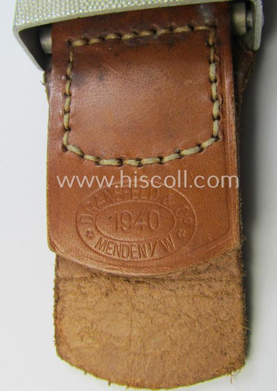 Superb, police (ie. 'Polizei') aluminium-based belt-buckle (ie. 'Koppelschloss für Mannschaften u. Uffz. der Polizei') being a maker- (ie. 'Dransfeld & Co.'-) marked and '1940'-dated example that comes in a fully untouched, condition