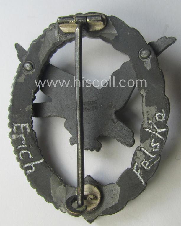 WH (Luftwaffe) 'Fliegerschützen-Abzeichen ohne Blitzbündel' being a neatly maker- (ie. 'Wilh. Deumer'-) marked- and/or: typical zinc- (ie. 'Feinzink'-) based example as was produced by the maker: 'Wilh. Deumer' and that shows a period-engravi...