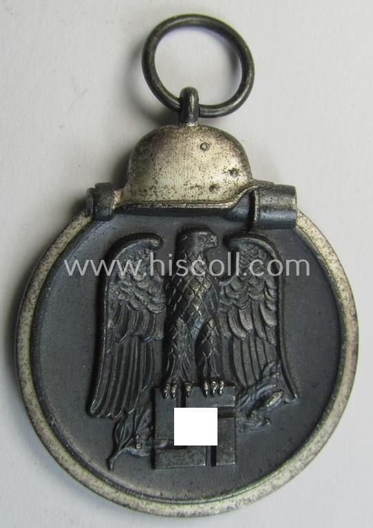 Attractive medal-set: 'Winterschlacht im Osten 1941-42' being a non-maker-marked- (and/or 'Feinzink'-based) specimen and that comes together with its (minimally confectioned) ribbon (ie. 'Bandabschnitt')