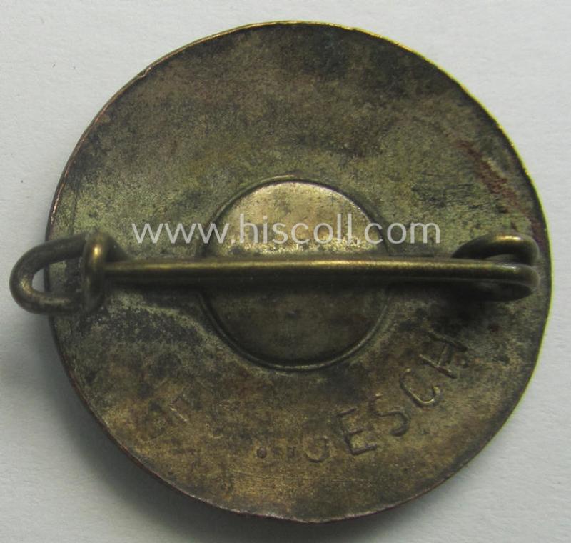 Early-pattern 'N.S.D.A.P. - Parteiabzeichen' showing a: 'Ges.Gesch.'-patent-pending-designation