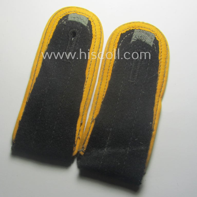 Pair of fully matching, 'M44'- ie. 'simplified'-pattern, Waffen-SS NCO-type shoulderstraps as piped in the golden-yellow-coloured branchcolour for usage by an 'Unterscharführer' who served within the: 'Waffen-SS Kavallerie o. Aufklärungs-Trpn.'