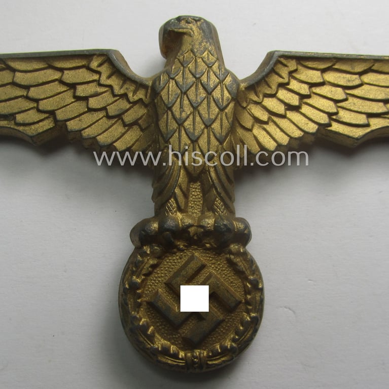 Truly worn, larger-sized, WH (Kriegsmarine): 'DAK' (ie. 'Deutsches Afrikakorps') zinc- (ie. 'Feinzink'-) based- and/or 'Feuervergoldetes' so-called: 'pith-helmet' eagle-device