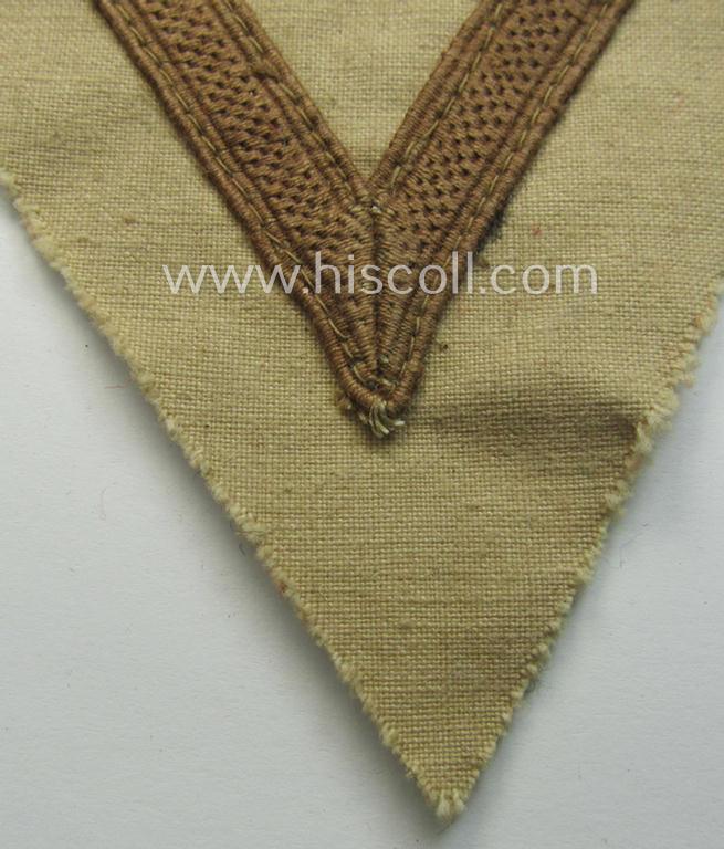 WH (Luftwaffe) tropical-styled, 'Armwinkel' (or: arm-chevron) as executed on typical beige- ie. tan-coloured linnen as was specifically intended for usage by a soldier with the rank of a: 'Gefreiter'