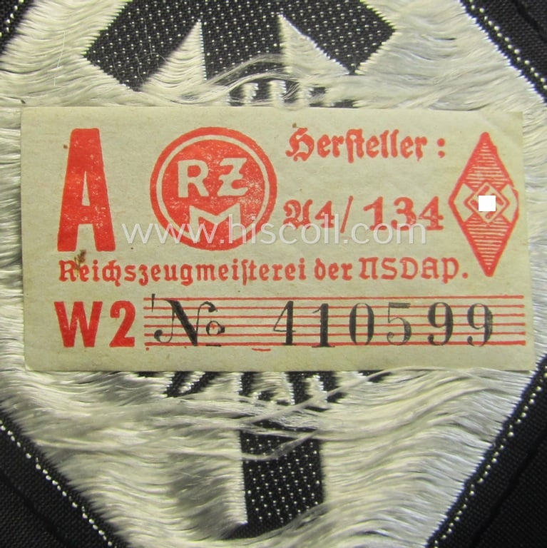 HJ- (ie. 'Hitlerjugend') 'Leistungsabzeichen in Silber in Stoff' that retains its 'RzM'-etiket