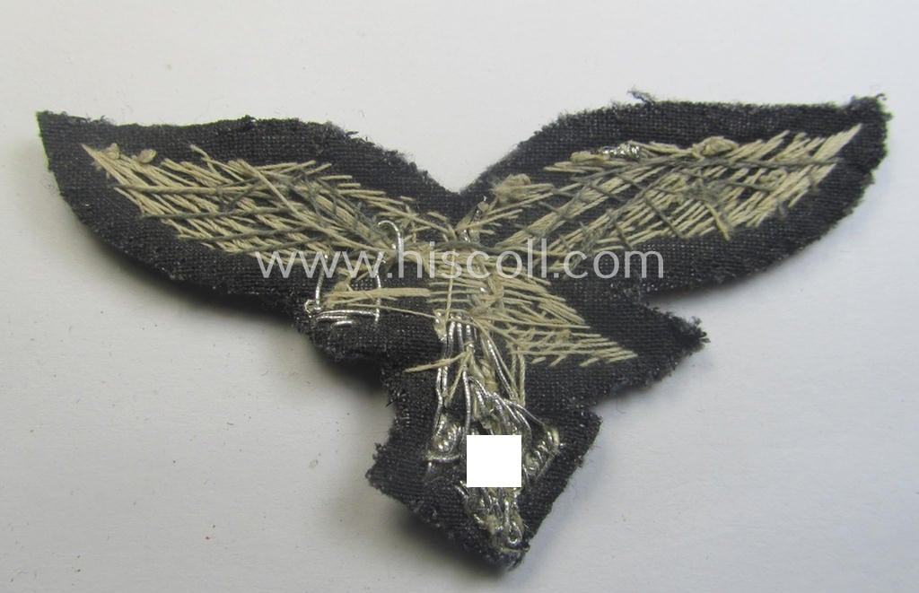 WH (Luftwaffe) officers'-pattern breast-eagle (ie. 'Brustadler für Offiziere der Luftwaffe') being a neatly hand-embroidered example of the: 'Extra Qualität' that comes in a moderately used- (ie. carefully tunic-removed-), condition
