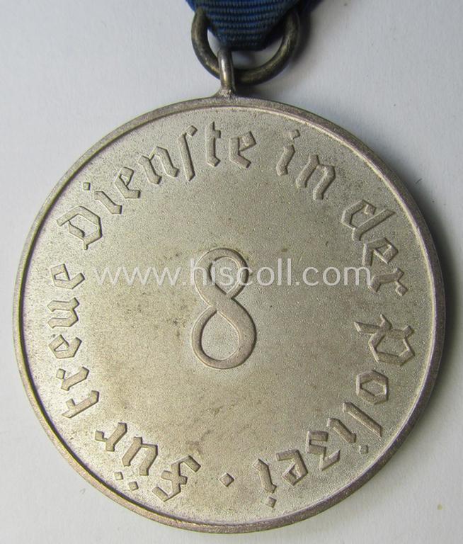 Attractive, bright-silver-toned so-called: 'Polizei-Dienstauszeichnung der 3. Stufe' (or: police loyal service medal of the 3rd class as was awarded for 8 years of service) that comes mounted on its period ribbon (ie. 'Bandabschnitt') as issued