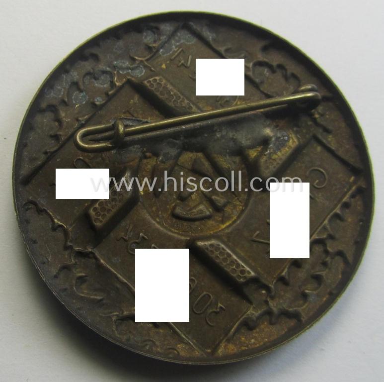 Golden-bronze-toned SA- (ie. 'Sturmabteilungen'-) related 'tinnie' being a non-maker-marked example depicting a swastika, SA-logo and text that simply reads: 'Brigade 41' - Thür-Ost - Greiz - 30.6-1.7-1934'