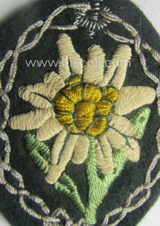WH (Heeres) neatly hand-embroidered- and/or typical NCO- ie. officers'- (ie. 'variant'-) pattern so-called: 'Edelweiss'-arm-badge (as specifically intended for usage by an NCO or officer serving within the 'Geb.-Jäger-Trpn.'
