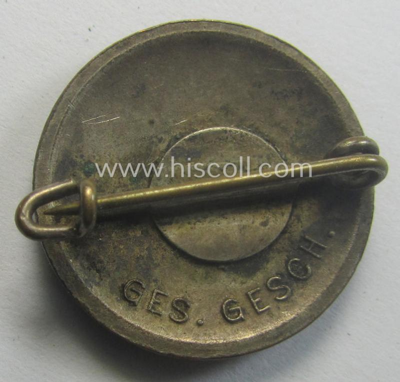 Early-pattern 'N.S.D.A.P. - Parteiabzeichen' showing a: 'Ges.Gesch.'-patent-pending-designation