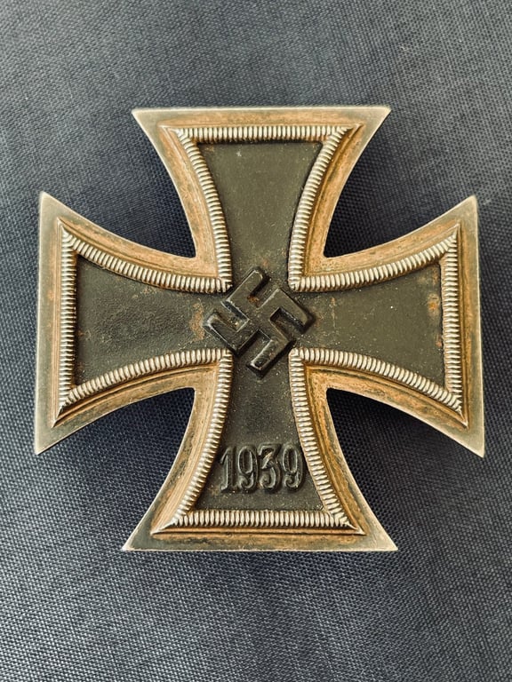 RARE CONCURVED WWII 1ST CLASS IRON CROSS STAMPED NUMBER 4, STEINHAUER & LUCK OF LUDENSCHHELD.
