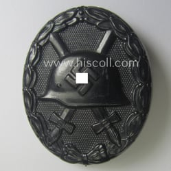 Superb, black-class wound-badge (or: 'Verwundeten-Abzeichen in Schwarz') being...