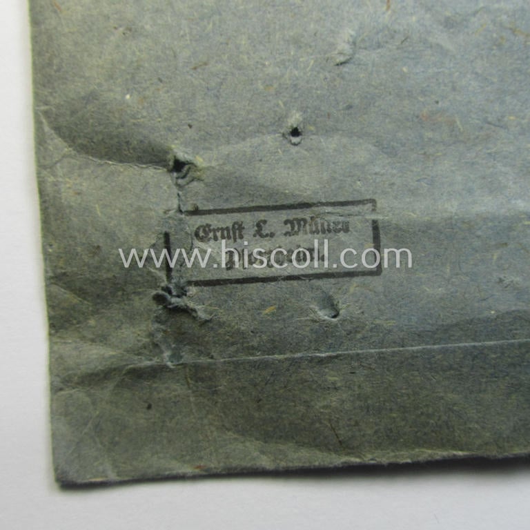 'Zellstoff'-based medal-pouch entitled: 'Infanterie-Sturmabzeichen - Silber' (or: silver-class infantry assault-badge ie. IAB) as executed in typical: 'Zellstoff'-based paper as was intended to store an IAB by the maker: 'Ernst L. Müller'