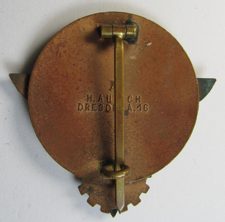 Clearly worn 'HJ'- ('Hitlerjugend') ie. 'BDM'- ('Bund Deutscher Mädel') related: 'Reichsberufswettkampf-Siegerabzeichen' (of the 2nd model) entitled: 'Kreissieger 1939' and being a neatly maker- (ie.: 'Hermann Aurich'-) marked example