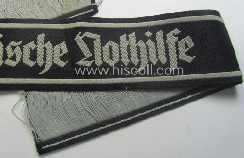 Minimally used and/or carefully tunic-removed, TeNo-cuff-title (ie. 'Ärmelstreifen') entitled: 'Technische Nothilfe' (= 'TeNo') being a full length example as was woven in the neat 'BeVo'-weave pattern