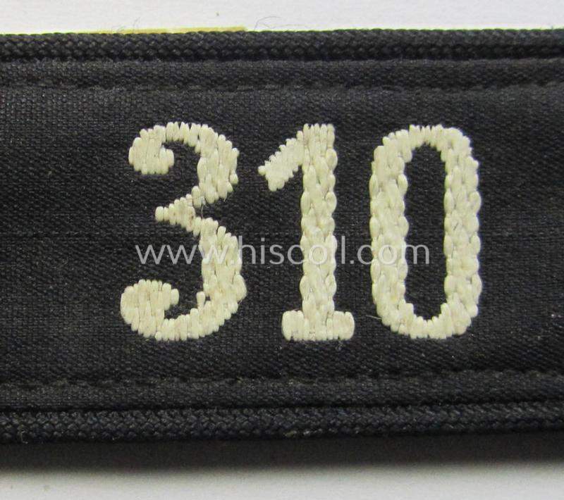 Neat - and naturally single! - black-piped 'DJ- o. Deutsches Jungvolk' shoulderstrap as was intended for usage by a: 'DJ-Mitglied' who served within the: 'Bann 310' (310 = 'Donau') and that comes with its period-attached 'RzM'-etiket
