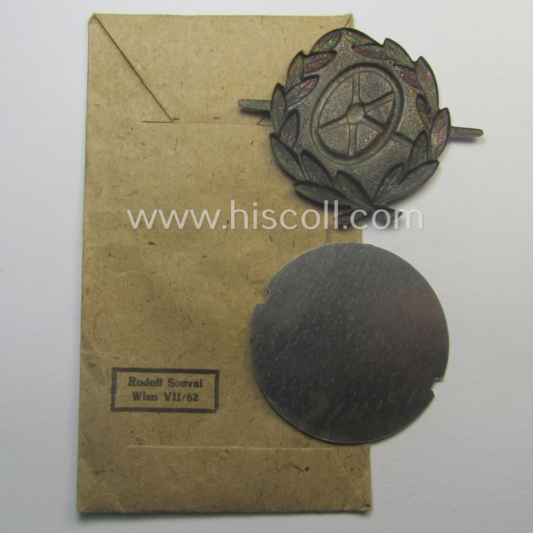WH (Heeres, LW ie. Waffen-SS-) so-called: 'Kraftfahrbewährungs-Abzeichen in Silber' being a 'virtually mint' example as was produced by the Austrian-based maker: 'Rudolf Souval - Wien VII/62' and that came stored in its 'Zellstoff'-based pouch