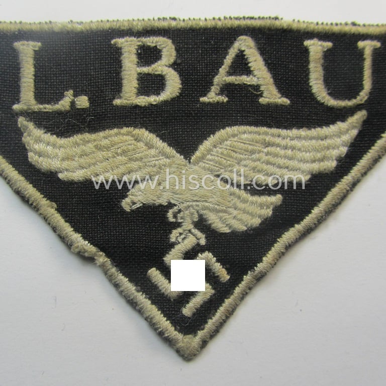 WH (Luftwaffe)-related- (EM- ie. NCO-pattern-) machine-embroidered breast-badge ie. eagle-device showing the text: 'L. Bau' as was (I deem) specifically intended for staff working within the WH 'Generalluftzeugmeister'- (ie. 'GL'-) organisation